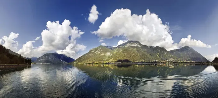 Framed Print : Panorama of Lake Achensee with the Rofan Mountains and bizarre clouds in the sky reflecting in the lake, Achensee, Tyrol, Austria, Europe