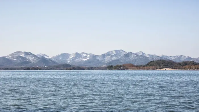 Framed Print : Panorama View of the West Lake against snow covered mountains, Zhejiang, China