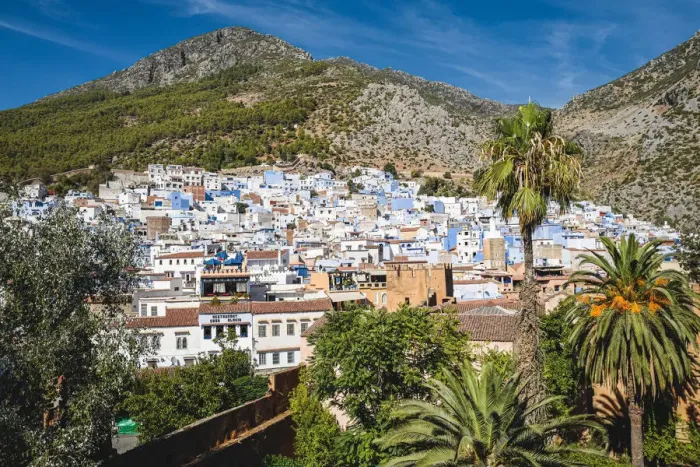 Framed Print : Panoramic aerial view of Chefchaouen city skyline in front of the Rif mountains, Morocco Framed Print : Panoramic aerial view of Chefchaouen city skyline in front of the Rif mountains, Morocco