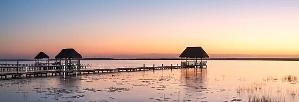 Panoramic of pier and hut at sunset, Mexico