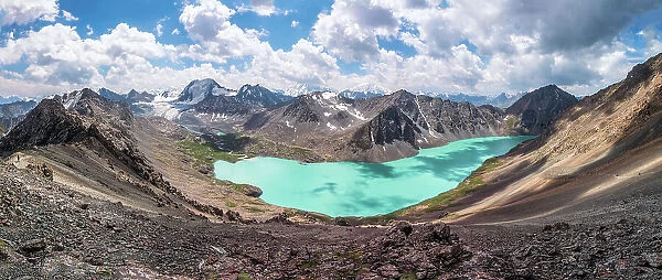 The panoramic view of Ala-Kul lake on high altitude Tien Shan mountains, near Karakol, Kyrgyzstan
