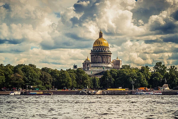 Panoramic view of Saint Isaacs Cathedral in green Saint Petersburg city, Russia