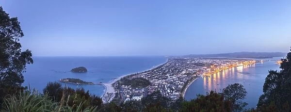 Panoramic view of the town of Mount Maunganui and the Port of Tauranga at nightfall, from the summit of Mount Maunganui, Bay of Plenty, North Island, New Zealand