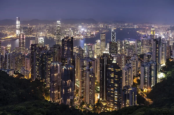 Panoramic view from Victoria Peak across the high-rise buildings at night, Central District, Hong Kong, China