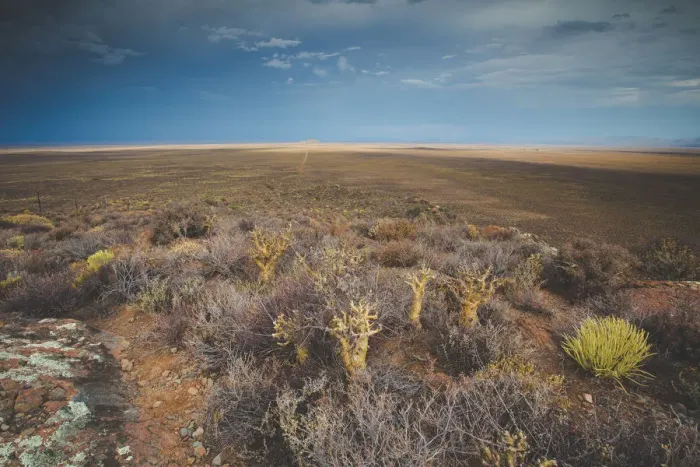 Framed Print : Panoramic views over the Tankwa Karoo Desert with dramatic thunderclouds in the sky Framed Print : Panoramic views over the Tankwa Karoo Desert with dramatic thunderclouds in the sky