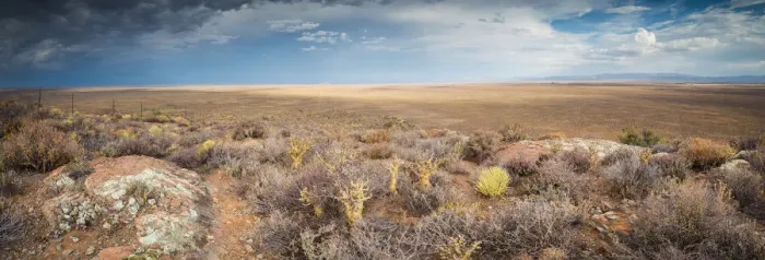 Framed Print : Panoramic views over the Tankwa Karoo Desert with dramatic thunderclouds in the sky Framed Print : Panoramic views over the Tankwa Karoo Desert with dramatic thunderclouds in the sky