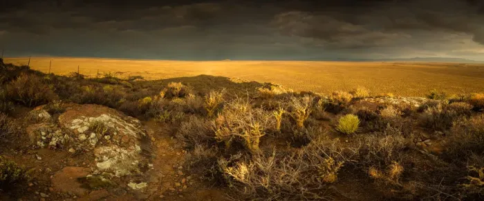 Framed Print : Panoramic views over the Tankwa Karoo Desert with dramatic thunderclouds in the sky Framed Print : Panoramic views over the Tankwa Karoo Desert with dramatic thunderclouds in the sky