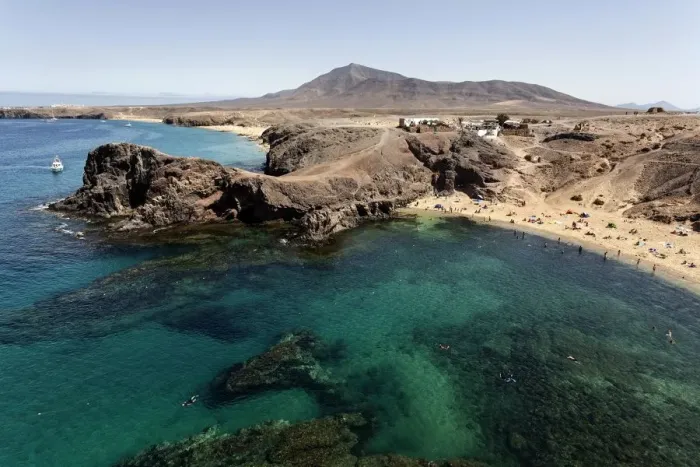 Framed Print : Papagayo beaches or Playas de Papagayo, Playa Blanca in the back, Lanzarote, Canary Islands