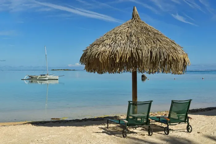 Framed Print : Parasol and sunloungers on the beach, Moorea, French Polynesia Framed Print : Parasol and sunloungers on the beach, Moorea, French Polynesia