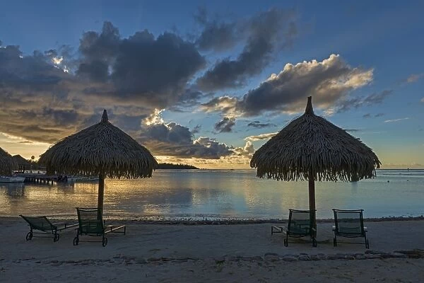 Parasols and sun loungers on the beach, evening atmosphere, Moorea, French Polynesia