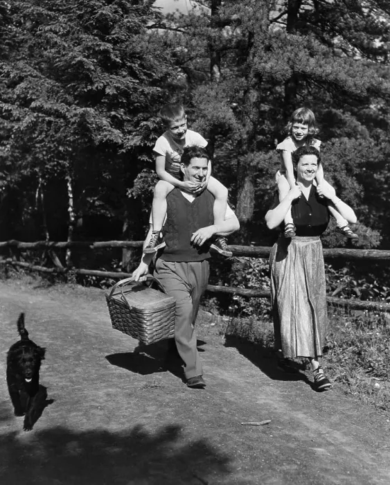 Framed Print : Parents Carrying Children for Picnic Framed Print : Parents Carrying Children for Picnic