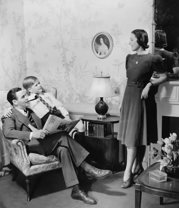 Framed Print : Parents with son (8-9) in living room (B&W) Framed Print : Parents with son (8-9) in living room (B&W)