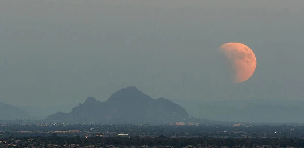Partially eclipsed supermoon, Phoenix, Arizona, USA