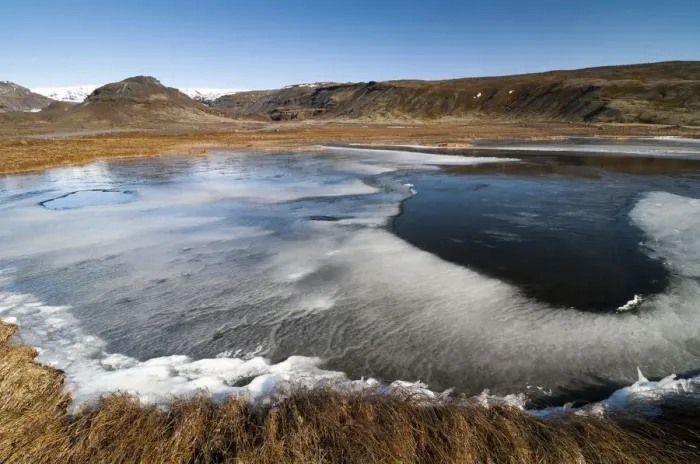 Framed Print : Partly frozen lake near Dyrholaey, Myrdalsjoekull Glacier, south coast, Iceland, Europe Framed Print : Partly frozen lake near Dyrholaey, Myrdalsjoekull Glacier, south coast, Iceland, Europe
