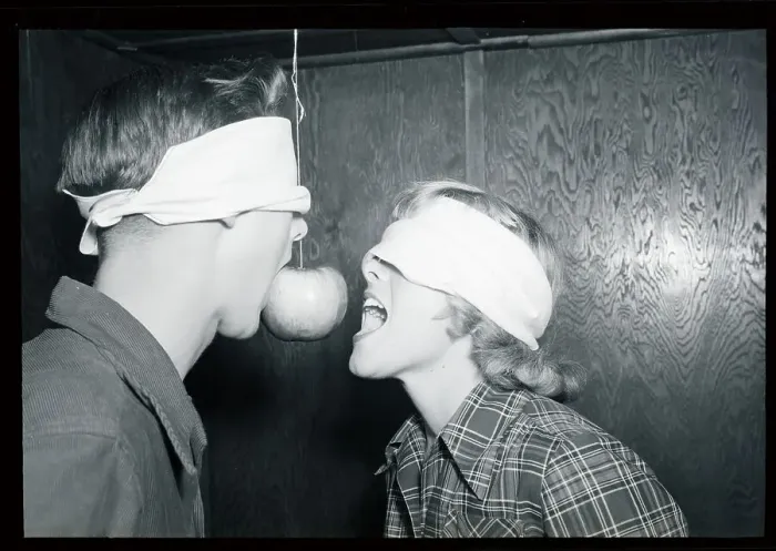 Framed Print : Party Game with an Apple on a String Framed Print : Party Game with an Apple on a String
