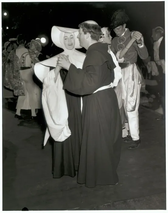 Framed Print : Party Goers Wearing Religious Costumes Framed Print : Party Goers Wearing Religious Costumes
