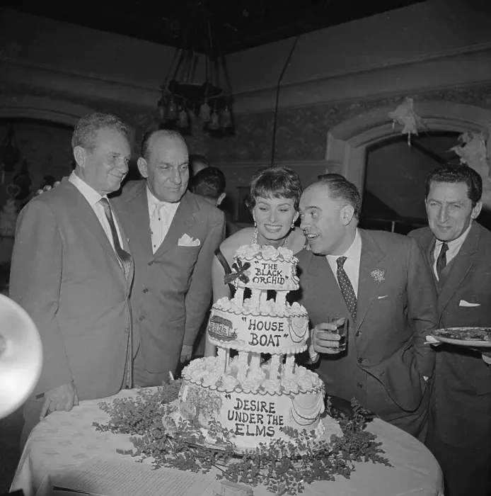 Framed Print : Party Hostess Sophia Loren Looks Over Cake Framed Print : Party Hostess Sophia Loren Looks Over Cake