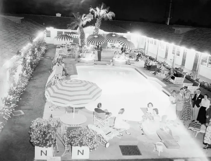 Framed Print : Party by Swimming Pool at Normandy Village Hotel