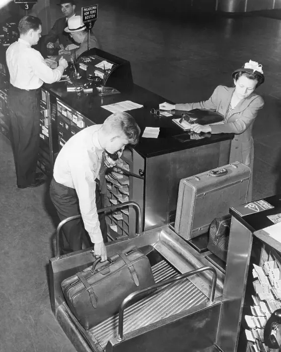 Framed Print : Passenger Checking in at Ticket Counter, 1941 Framed Print : Passenger Checking in at Ticket Counter, 1941
