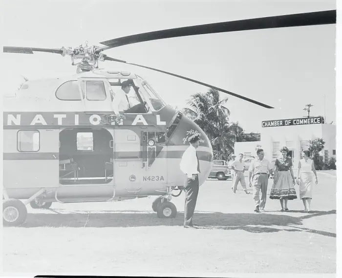 Framed Print : Passengers Preparing to Board Helicopter Framed Print : Passengers Preparing to Board Helicopter