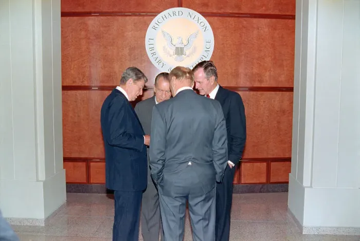 Framed Print : Four Past Presidents Huddling Together Framed Print : Four Past Presidents Huddling Together
