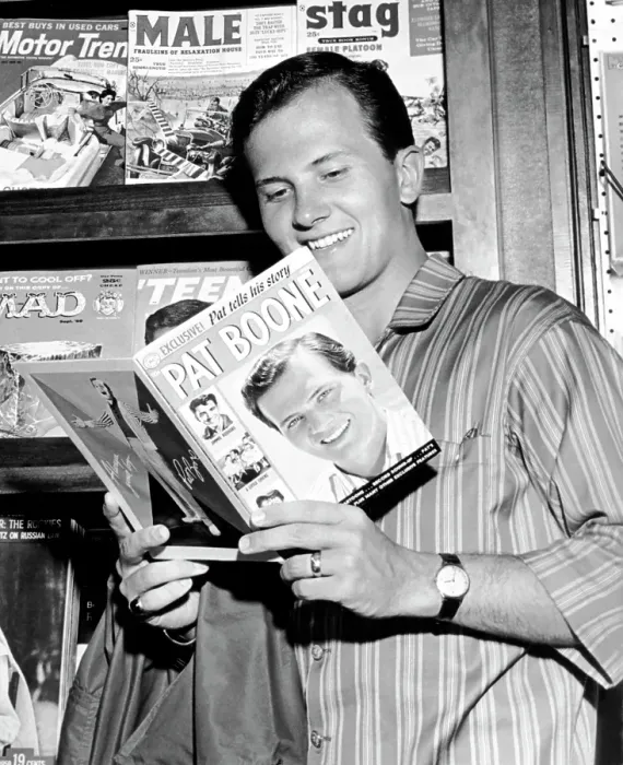 Framed Print : Pat Boone. Singer Pat Boone reads a fan magazine about himself in 1959 in Los Angeles Framed Print : Pat Boone. Singer Pat Boone reads a fan magazine about himself in 1959 in Los Angeles