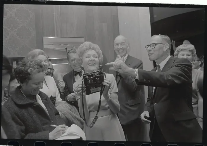 Framed Print : Pat Nixon Looking Through Camera