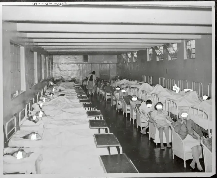 Framed Print : Patients Sitting in Chairs Near Others in Beds Framed Print : Patients Sitting in Chairs Near Others in Beds