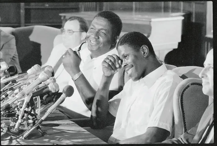 Framed Print : Patrick Ewing and John Thompson Laughing at News Conference Framed Print : Patrick Ewing and John Thompson Laughing at News Conference
