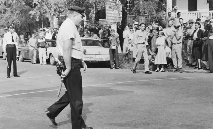 Framed Print : Patrolman Observing School Protesters Framed Print : Patrolman Observing School Protesters