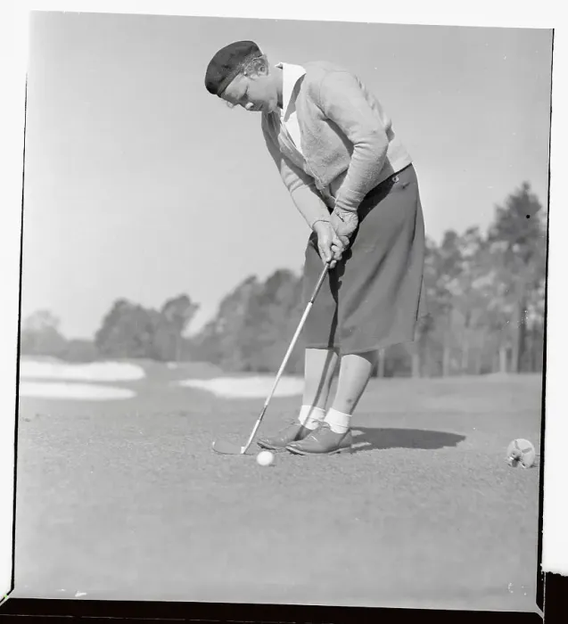 Framed Print : Patty Berg Putting on Golf Course
