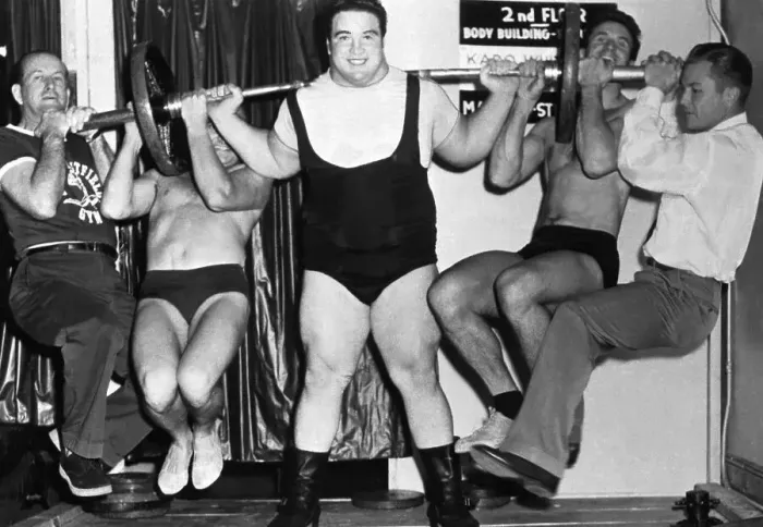 Framed Print : Paul Anderson Lifting Men on Barbell Framed Print : Paul Anderson Lifting Men on Barbell