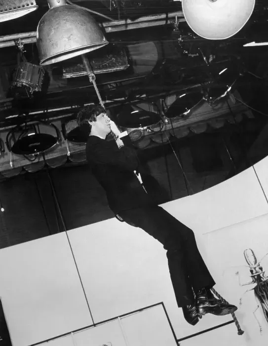 Framed Print : Paul McCartney Dangling from Rope Framed Print : Paul McCartney Dangling from Rope