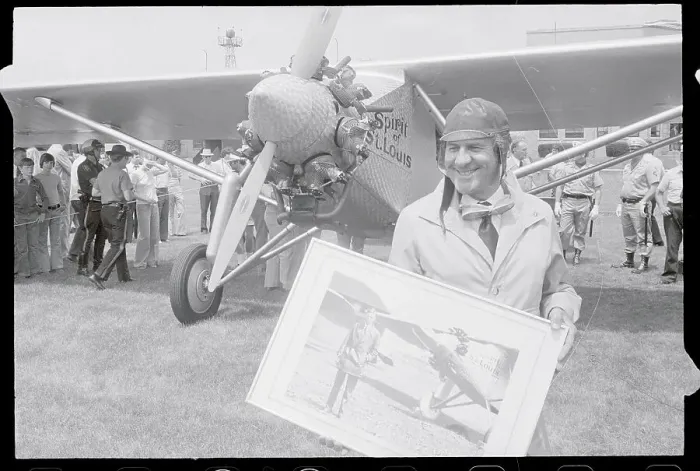 Framed Print : Paul Poberenzy Holding Photograph of Charles A. Lindbergh Framed Print : Paul Poberenzy Holding Photograph of Charles A. Lindbergh