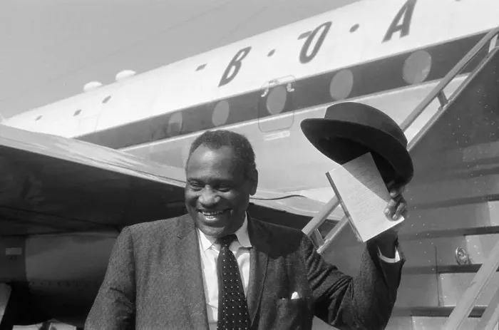 Framed Print : Paul Robeson Tipping His Hat to Family and Bystanders Framed Print : Paul Robeson Tipping His Hat to Family and Bystanders