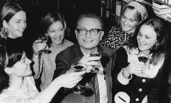 Framed Print : Paul Samuelson Offering Toast with Staff Members Framed Print : Paul Samuelson Offering Toast with Staff Members