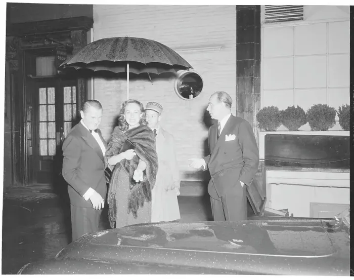 Framed Print : Paulette Goddard and Acquaintances in Front of El Morocco Club Framed Print : Paulette Goddard and Acquaintances in Front of El Morocco Club