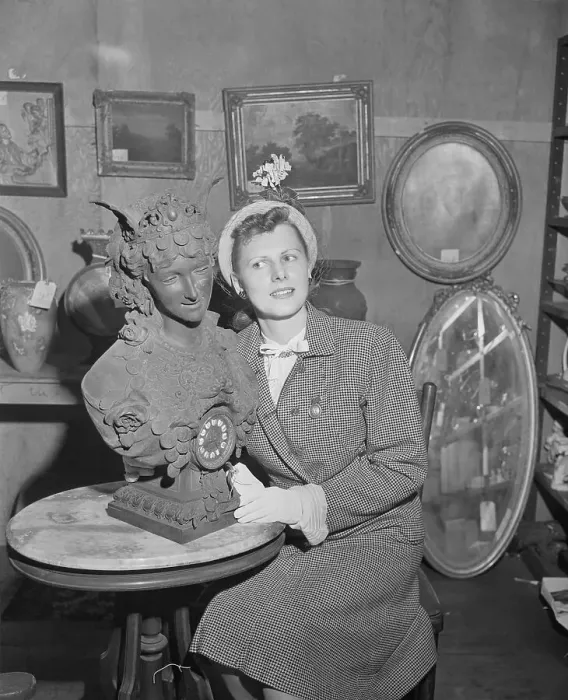 Framed Print : Pauline Delaney Posing Next to a Clock Framed Print : Pauline Delaney Posing Next to a Clock
