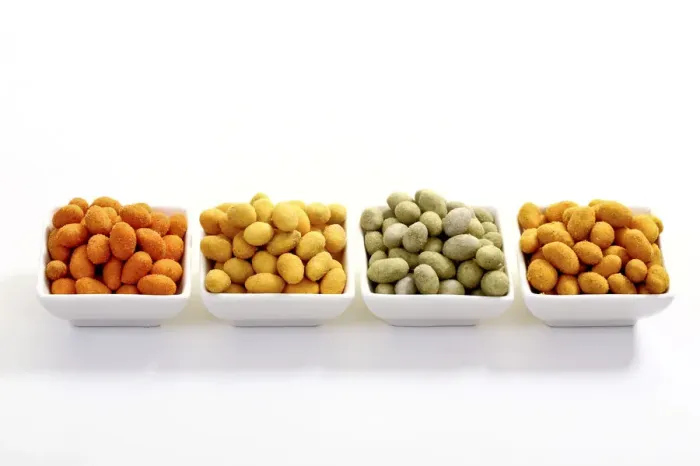 Framed Print : Peanuts in various flavoured coatings, chili, Wasabi, curry and paprika Framed Print : Peanuts in various flavoured coatings, chili, Wasabi, curry and paprika