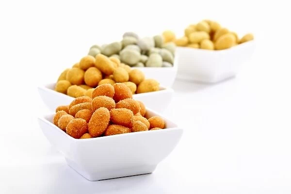 Peanuts in various flavoured coatings, chili, Wasabi, curry and paprika
