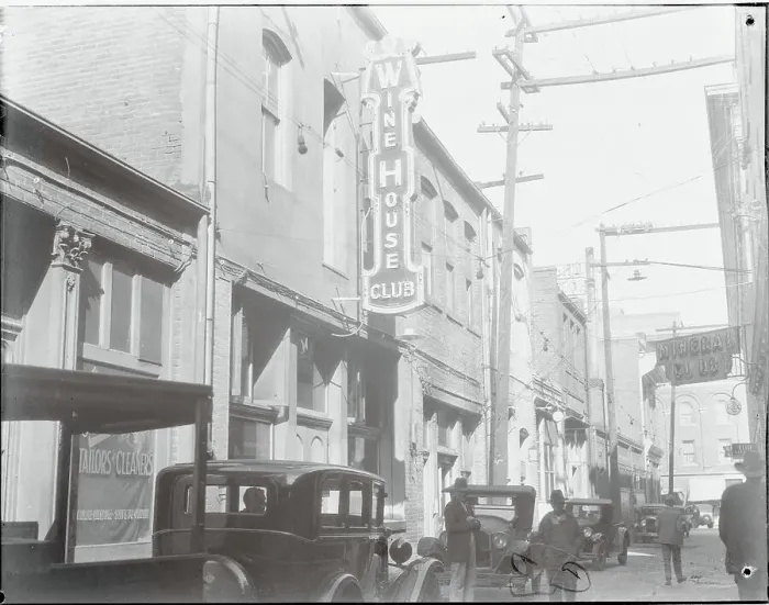 Framed Print : Pedestrians and automobiles near Wine House