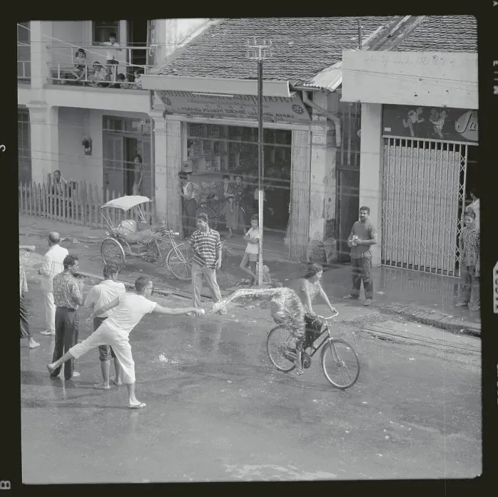Framed Print : Pedestrians Getting Wet on Wetting Holiday Framed Print : Pedestrians Getting Wet on Wetting Holiday
