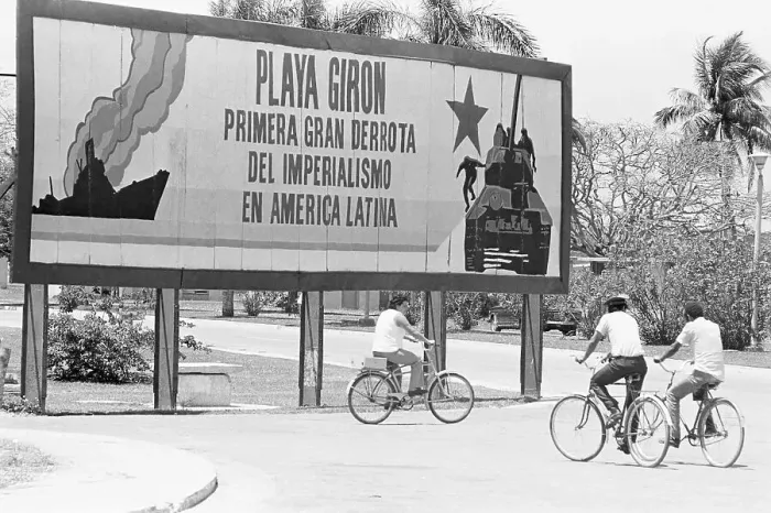 Framed Print : Pedestrians Passing Banner Depicting Cuban Pride Framed Print : Pedestrians Passing Banner Depicting Cuban Pride