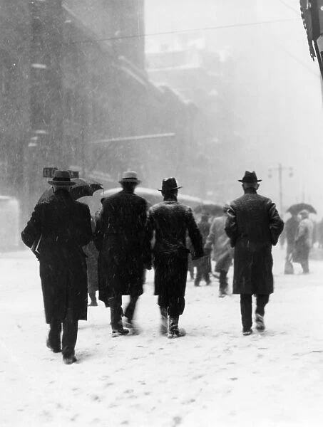 Pedestrians In Winter Snow