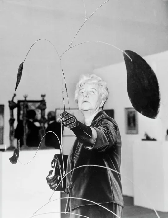 Framed Print : Peggy Guggenheim Adjusts A Mobile Framed Print : Peggy Guggenheim Adjusts A Mobile