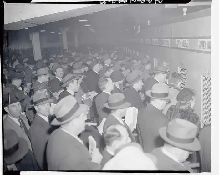 Framed Print : People Betting at Track