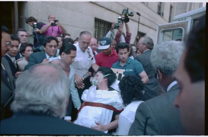 Framed Print : People Carried Imelda Marcos from Court Framed Print : People Carried Imelda Marcos from Court