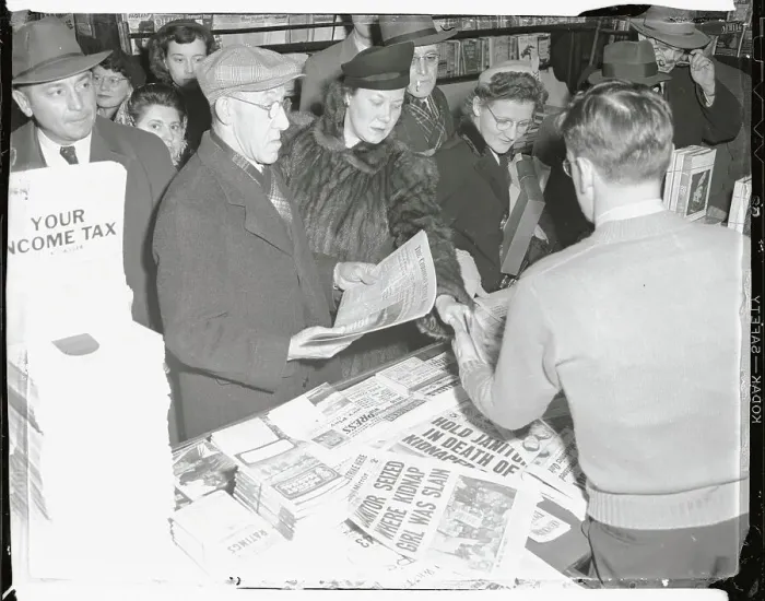 Framed Print : People Crowding Newsstand to Get Papers