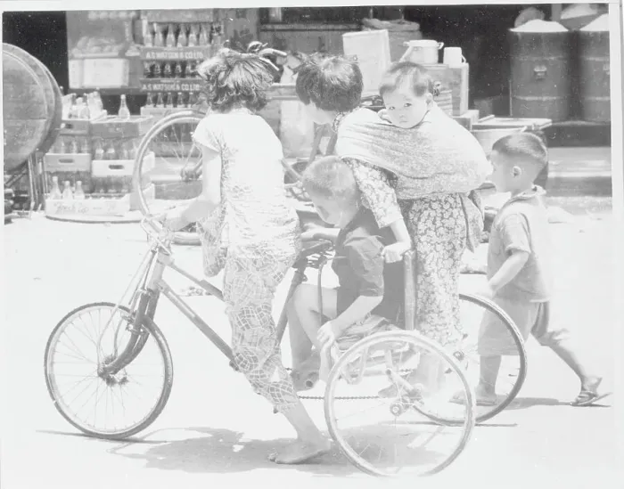 Framed Print : People Crowding on Tricycle Framed Print : People Crowding on Tricycle