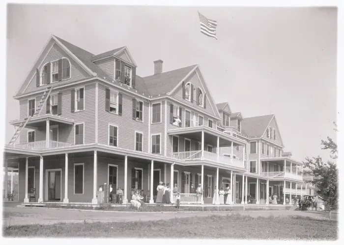 Framed Print : People on Exterior of Catskills Hotel with American Flag on Roof